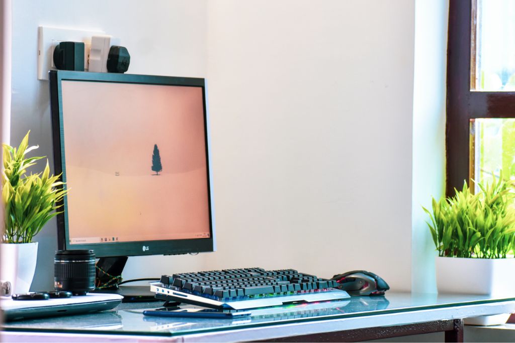 computer desktop with keyboard on desk