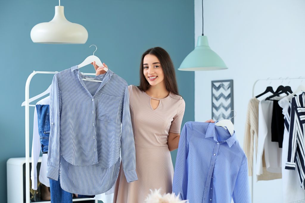 young woman choosing clothes to wear